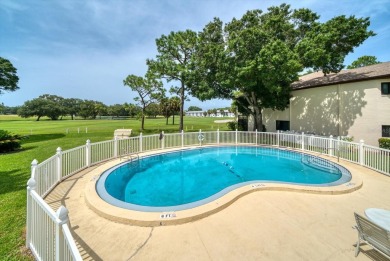 Enjoy Effortless Condo Living with Golf Course Views! Welcome to on East Bay Golf Club in Florida - for sale on GolfHomes.com, golf home, golf lot