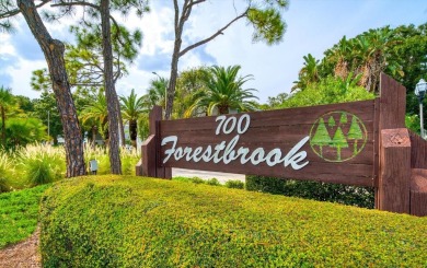 Enjoy Effortless Condo Living with Golf Course Views! Welcome to on East Bay Golf Club in Florida - for sale on GolfHomes.com, golf home, golf lot
