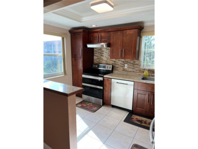 Large corner unit, fully updated and Move-in Ready in the on Inverrary Country Club in Florida - for sale on GolfHomes.com, golf home, golf lot