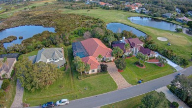 Mediterranean Estate with Marsh Views & Saltwater Pool in a on Marsh Valley Country Club in Florida - for sale on GolfHomes.com, golf home, golf lot