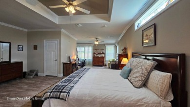 Looking for a Palm Harbor Wellington Model located in the on The Riverside Golf Club in Florida - for sale on GolfHomes.com, golf home, golf lot