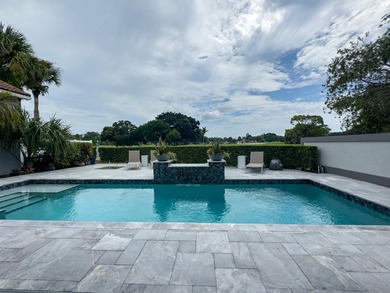 Stunning Fully Renovated 3BR + Office/4BA Pool Home in on  in Florida - for sale on GolfHomes.com, golf home, golf lot