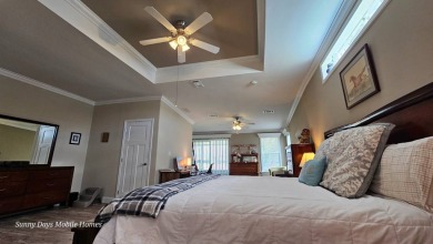 Looking for a Palm Harbor Wellington Model located in the on The Riverside Golf Club in Florida - for sale on GolfHomes.com, golf home, golf lot