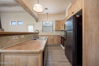 Welcome to 1903 Coyote Ridge, a beautifully maintained on Sonoma Ranch Golf Course in New Mexico - for sale on GolfHomes.com, golf home, golf lot