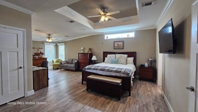 Looking for a Palm Harbor Wellington Model located in the on The Riverside Golf Club in Florida - for sale on GolfHomes.com, golf home, golf lot
