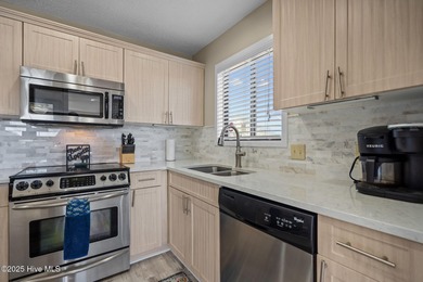 Uncover the ultimate beach getaway in this highly desirable on Oak Island Golf Club in North Carolina - for sale on GolfHomes.com, golf home, golf lot