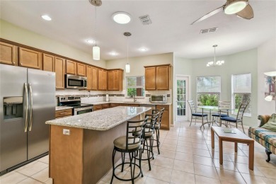 Lovely and beautifully maintained  2-bed, 2.5-bath plus a DEN on Stonegate Golf Club in Florida - for sale on GolfHomes.com, golf home, golf lot