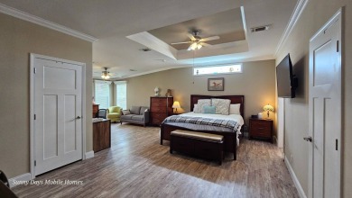 Looking for a Palm Harbor Wellington Model located in the on The Riverside Golf Club in Florida - for sale on GolfHomes.com, golf home, golf lot