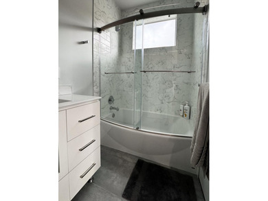 Stunning Fully Renovated 3BR + Office/4BA Pool Home in on  in Florida - for sale on GolfHomes.com, golf home, golf lot