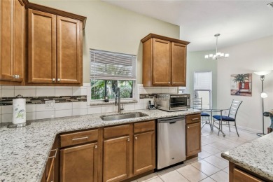 Lovely and beautifully maintained  2-bed, 2.5-bath plus a DEN on Stonegate Golf Club in Florida - for sale on GolfHomes.com, golf home, golf lot