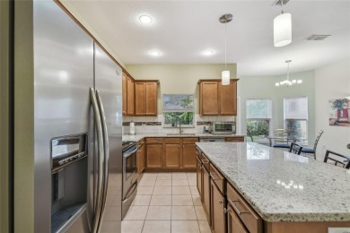 Lovely and beautifully maintained  2-bed, 2.5-bath plus a DEN on Stonegate Golf Club in Florida - for sale on GolfHomes.com, golf home, golf lot