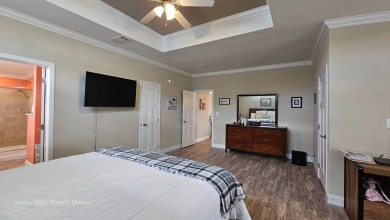Looking for a Palm Harbor Wellington Model located in the on The Riverside Golf Club in Florida - for sale on GolfHomes.com, golf home, golf lot