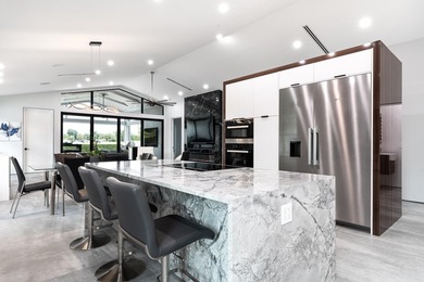 Stunning Fully Renovated 3BR + Office/4BA Pool Home in on  in Florida - for sale on GolfHomes.com, golf home, golf lot