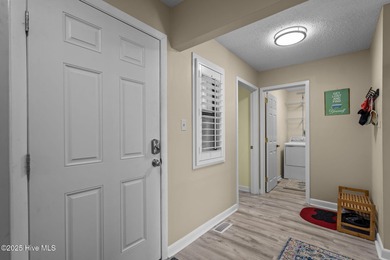 Uncover the ultimate beach getaway in this highly desirable on Oak Island Golf Club in North Carolina - for sale on GolfHomes.com, golf home, golf lot