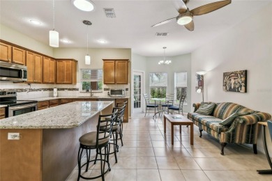 Lovely and beautifully maintained  2-bed, 2.5-bath plus a DEN on Stonegate Golf Club in Florida - for sale on GolfHomes.com, golf home, golf lot