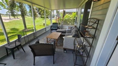 Looking for a Palm Harbor Wellington Model located in the on The Riverside Golf Club in Florida - for sale on GolfHomes.com, golf home, golf lot