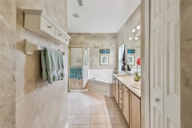 Lovely and beautifully maintained  2-bed, 2.5-bath plus a DEN on Stonegate Golf Club in Florida - for sale on GolfHomes.com, golf home, golf lot