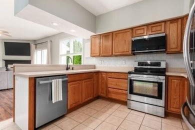 Just in time for Summer! This beautiful home is situated against on Crown Hill Golf Club in Ohio - for sale on GolfHomes.com, golf home, golf lot
