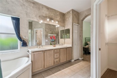 Lovely and beautifully maintained  2-bed, 2.5-bath plus a DEN on Stonegate Golf Club in Florida - for sale on GolfHomes.com, golf home, golf lot