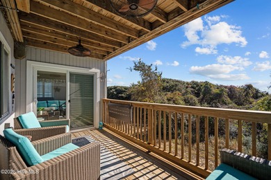 Uncover the ultimate beach getaway in this highly desirable on Oak Island Golf Club in North Carolina - for sale on GolfHomes.com, golf home, golf lot