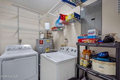 Uncover the ultimate beach getaway in this highly desirable on Oak Island Golf Club in North Carolina - for sale on GolfHomes.com, golf home, golf lot