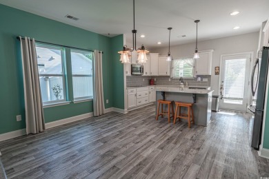 Spacious two-story home with four-bedrooms, two-and-a-half-bath on Shaftesbury Glen Golf and Fish Club in South Carolina - for sale on GolfHomes.com, golf home, golf lot
