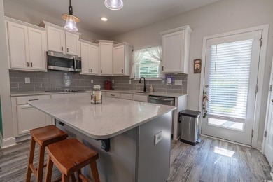 Spacious two-story home with four-bedrooms, two-and-a-half-bath on Shaftesbury Glen Golf and Fish Club in South Carolina - for sale on GolfHomes.com, golf home, golf lot