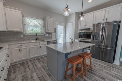 Spacious two-story home with four-bedrooms, two-and-a-half-bath on Shaftesbury Glen Golf and Fish Club in South Carolina - for sale on GolfHomes.com, golf home, golf lot