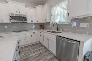 Spacious two-story home with four-bedrooms, two-and-a-half-bath on Shaftesbury Glen Golf and Fish Club in South Carolina - for sale on GolfHomes.com, golf home, golf lot
