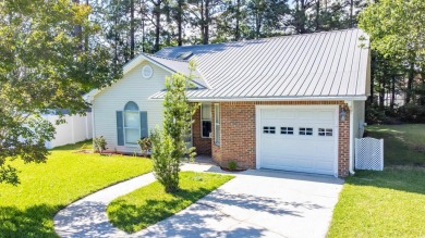Welcome to 9664 Middleton Ct - a charming Lowcountry-style on Indigo Creek Golf Club in South Carolina - for sale on GolfHomes.com, golf home, golf lot