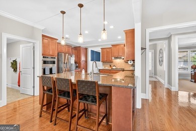 Located within the exclusive Reunion Country Club, this on Reunion Golf Club in Georgia - for sale on GolfHomes.com, golf home, golf lot