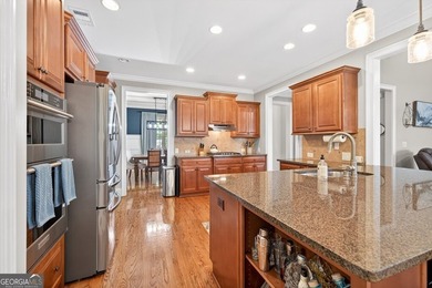 Located within the exclusive Reunion Country Club, this on Reunion Golf Club in Georgia - for sale on GolfHomes.com, golf home, golf lot