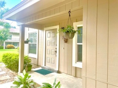 SUPER VALUE 3 bedroom townhome! This private end unit features a on Riverbend Golf Club in Florida - for sale on GolfHomes.com, golf home, golf lot