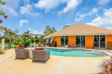 This 3 bedroom with 2 full bathroom CBS pool home is located on on Evergreen Club in Florida - for sale on GolfHomes.com, golf home, golf lot