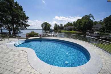 Welcome to 216 Dawn Island Trail, an elegant executive home with on Timberlake Country Club in South Carolina - for sale on GolfHomes.com, golf home, golf lot