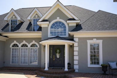 Welcome to 216 Dawn Island Trail, an elegant executive home with on Timberlake Country Club in South Carolina - for sale on GolfHomes.com, golf home, golf lot