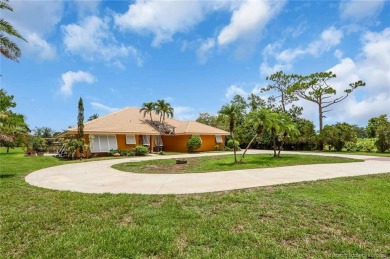 This 3 bedroom with 2 full bathroom CBS pool home is located on on Evergreen Club in Florida - for sale on GolfHomes.com, golf home, golf lot