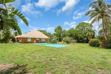 This 3 bedroom with 2 full bathroom CBS pool home is located on on Evergreen Club in Florida - for sale on GolfHomes.com, golf home, golf lot