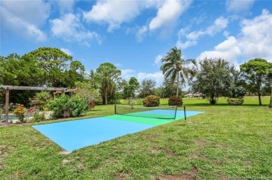 This 3 bedroom with 2 full bathroom CBS pool home is located on on Evergreen Club in Florida - for sale on GolfHomes.com, golf home, golf lot