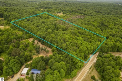 If you are looking for privacy and a beautifully wooded setting on Champion Hill Golf Club in Michigan - for sale on GolfHomes.com, golf home, golf lot