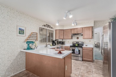 Welcome to this beautifully maintained 3-bedroom, 2-bathroom on Arrowhead Country Club in Arizona - for sale on GolfHomes.com, golf home, golf lot