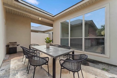 Welcome to effortless living in the highly sought-after Pelican on Pelican Point Golf Club in Louisiana - for sale on GolfHomes.com, golf home, golf lot