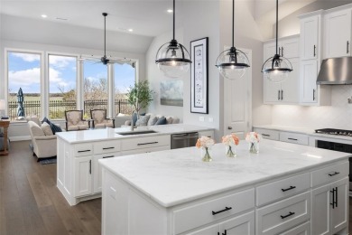 LAKE VIEW Highland built SINGLE STORY home is located in highly on The Tribute At the Colony in Texas - for sale on GolfHomes.com, golf home, golf lot