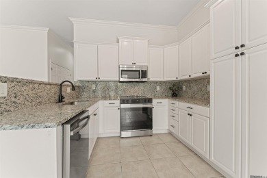 Welcome to effortless living in the highly sought-after Pelican on Pelican Point Golf Club in Louisiana - for sale on GolfHomes.com, golf home, golf lot