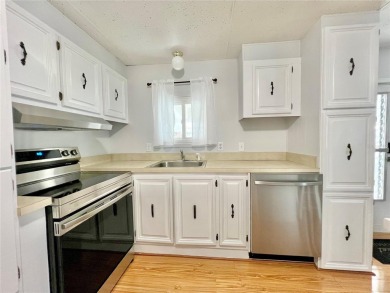 Welcome to this beautifully updated 2-bedroom, 2-bath home in on Fairway Village Golf Course in Florida - for sale on GolfHomes.com, golf home, golf lot