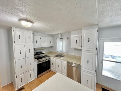 Welcome to this beautifully updated 2-bedroom, 2-bath home in on Fairway Village Golf Course in Florida - for sale on GolfHomes.com, golf home, golf lot