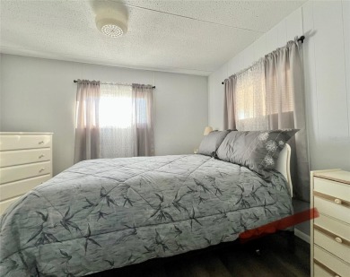 Welcome to this beautifully updated 2-bedroom, 2-bath home in on Fairway Village Golf Course in Florida - for sale on GolfHomes.com, golf home, golf lot