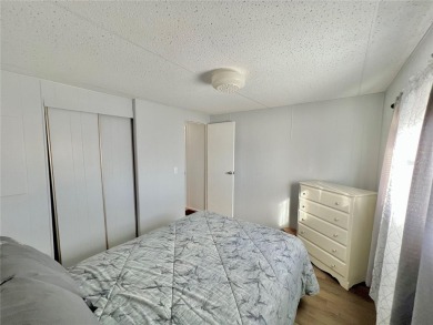 Welcome to this beautifully updated 2-bedroom, 2-bath home in on Fairway Village Golf Course in Florida - for sale on GolfHomes.com, golf home, golf lot