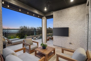 LAKE VIEW Highland built SINGLE STORY home is located in highly on The Tribute At the Colony in Texas - for sale on GolfHomes.com, golf home, golf lot