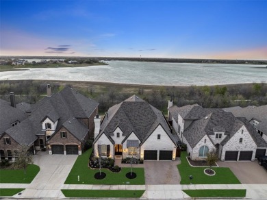 LAKE VIEW Highland built SINGLE STORY home is located in highly on The Tribute At the Colony in Texas - for sale on GolfHomes.com, golf home, golf lot